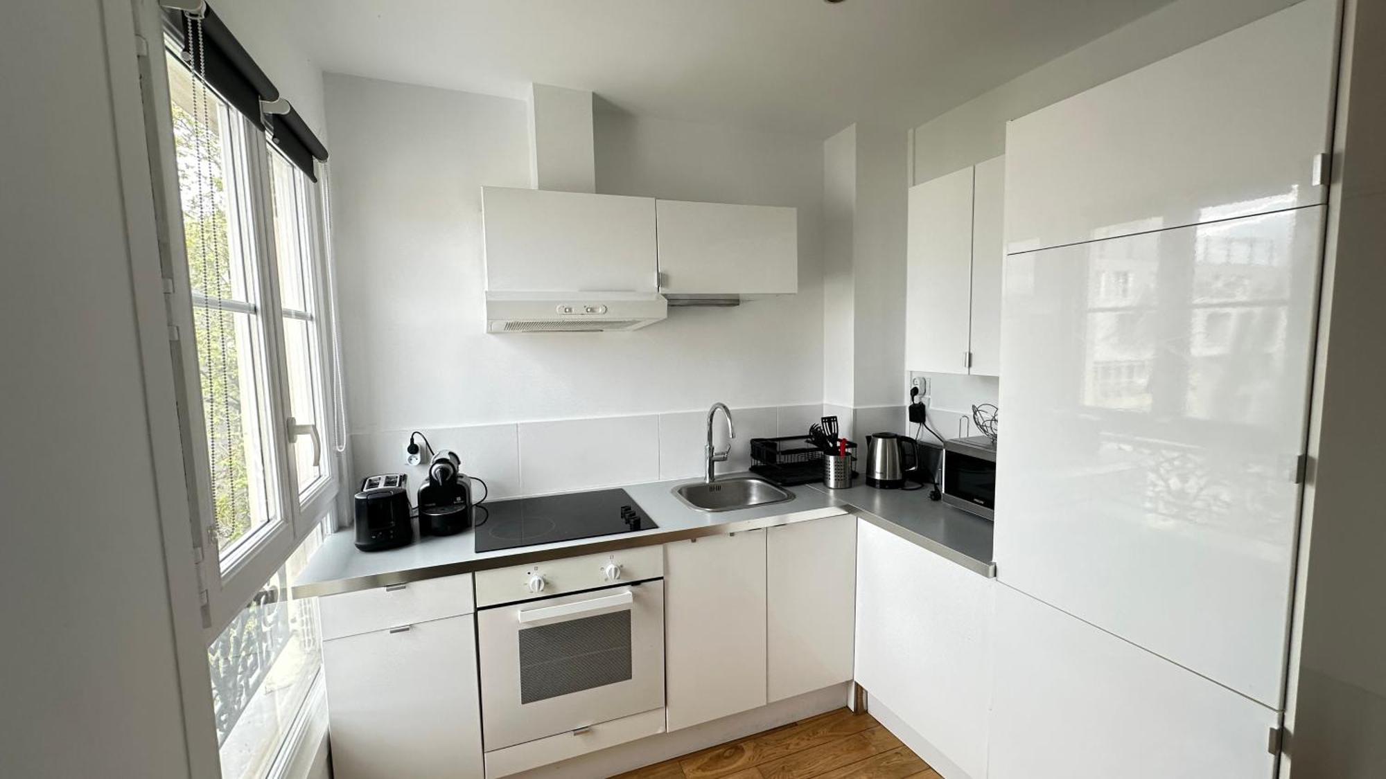 Ferienwohnung Charmant Studio Au Coeur Du 18E Paris Exterior foto